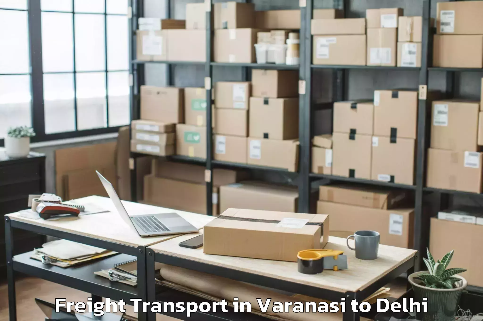 Book Varanasi to Unity One Janakpuri Mall Freight Transport